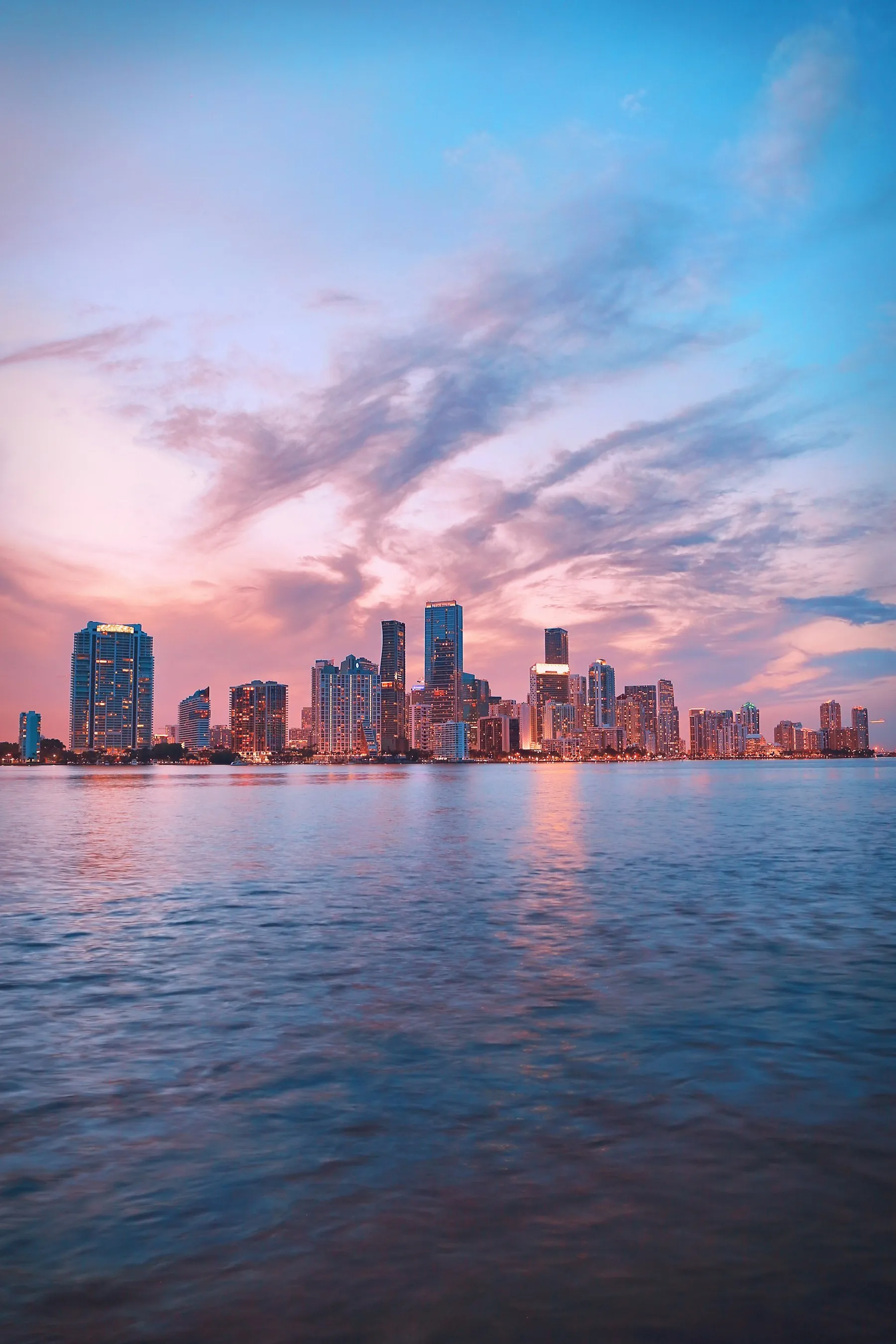Miami skyline across Biscayne Bay at sunset